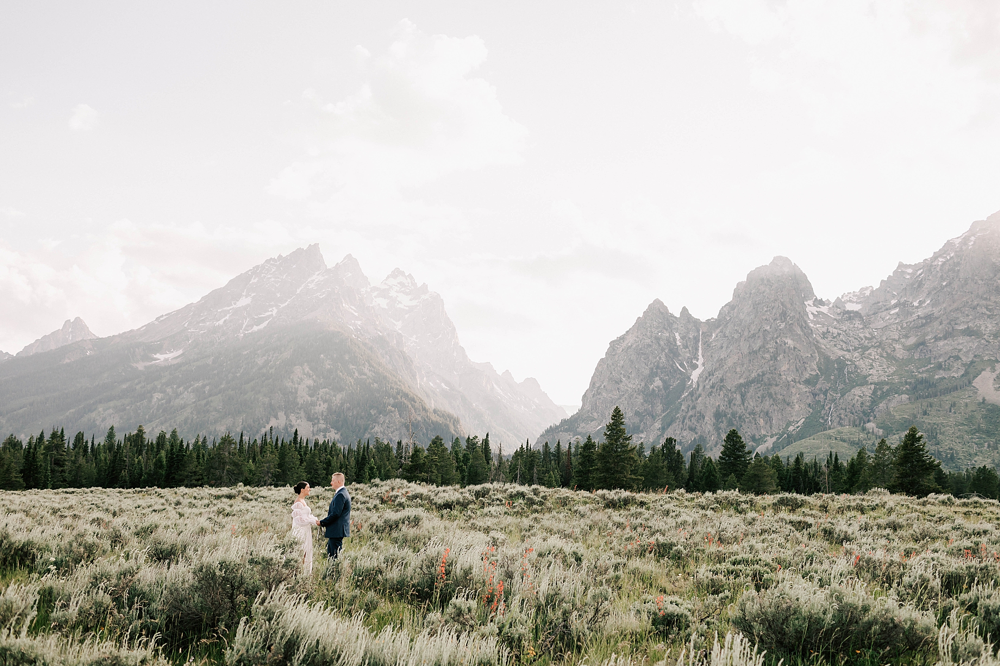 bride and groom in grand teton national park before their snake river ranch wedding.