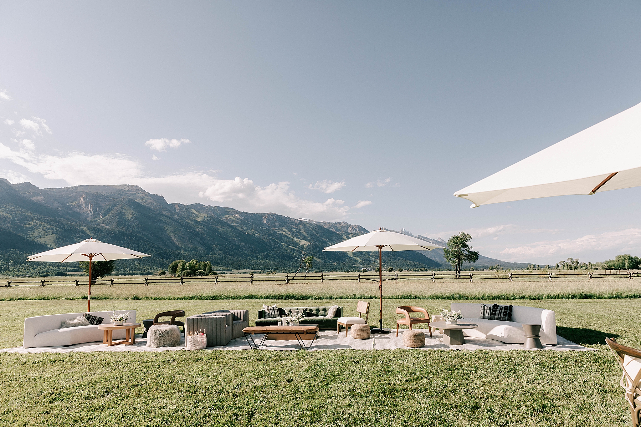 a cozy place for guests to lounge during cocktail hour at a snake river ranch wedding taken by local photographer adrian wayment photo.