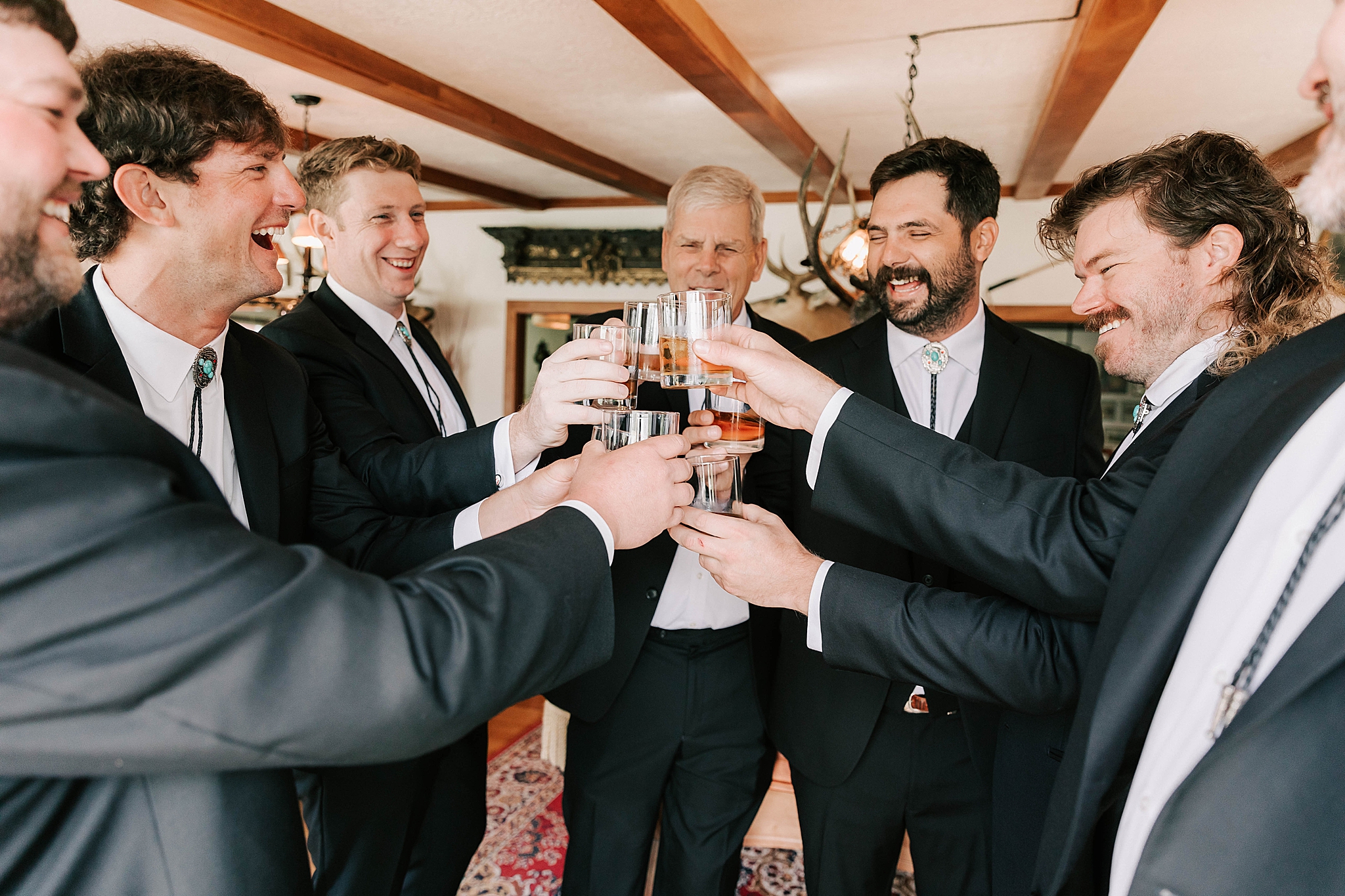 groom and groomsmen at a jackson hole ranch wedding taken by photographer adrian wayment.