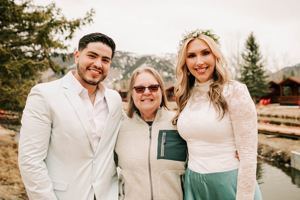 officiant and couple for their jackson hole destination wedding by adrian wayment photo
