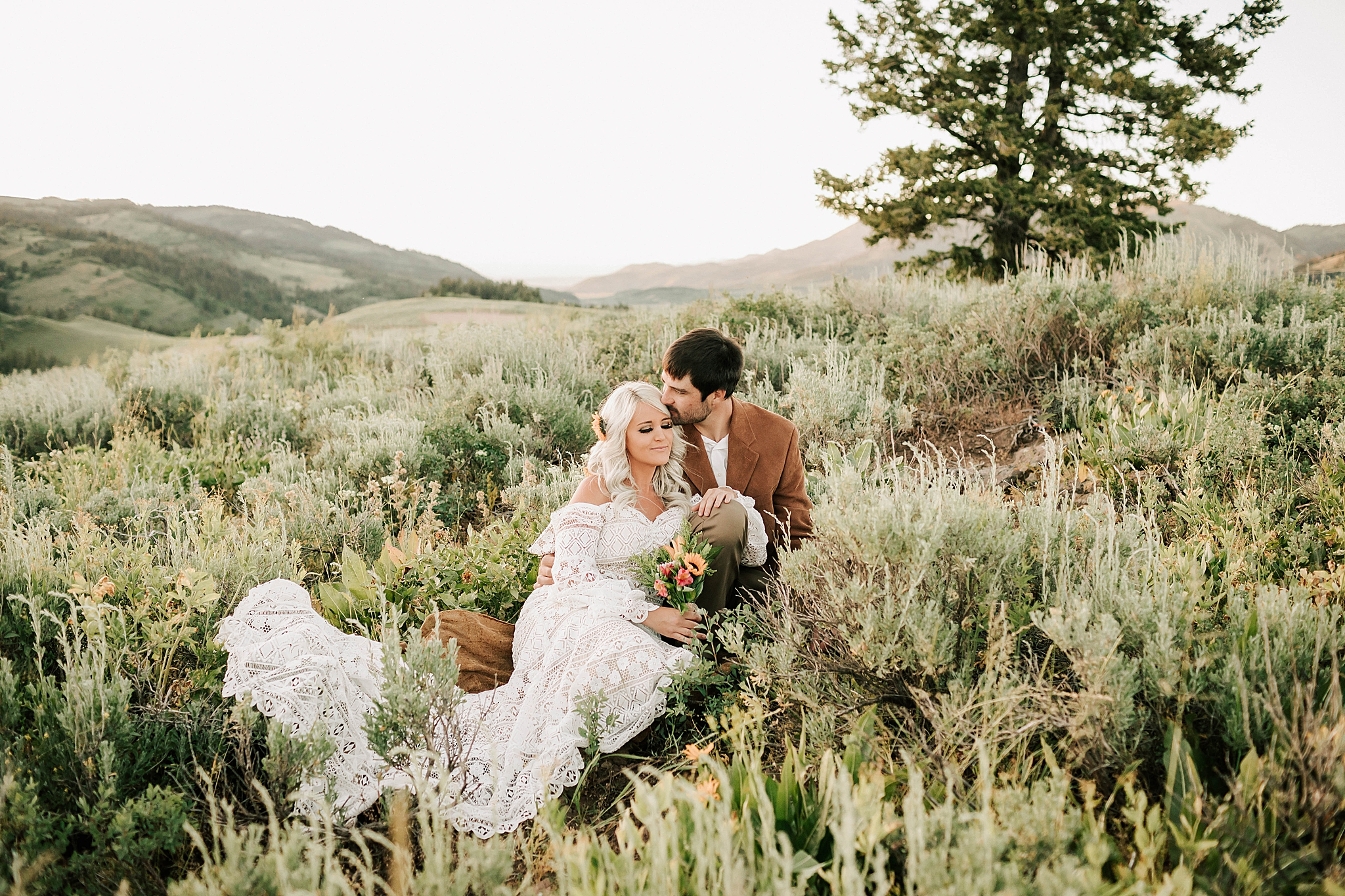 bride and groom at their wyoming wedding by adrian wayment photo