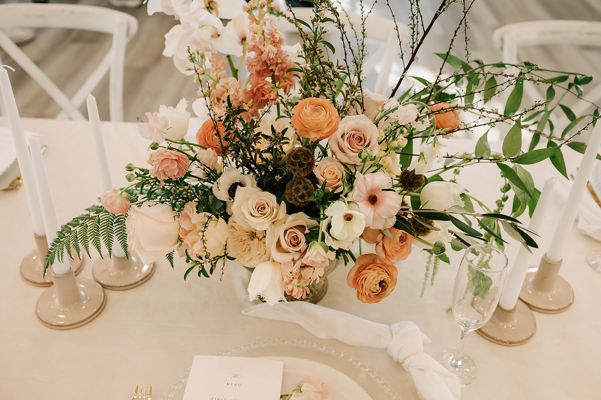 florals on a table as a centerpiece at a jackson hole wedding taken by jackson hole wedding photographer adrian wayment photo