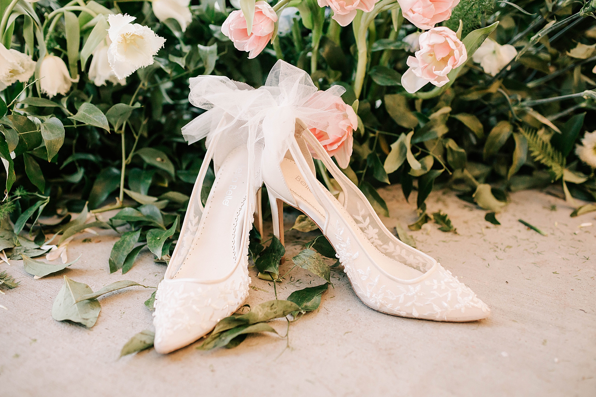 wedding day shoes next to flowers taken by wyoming wedding photographer adrian wayment photo